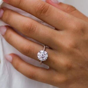 Woman's hand with engagement ring`