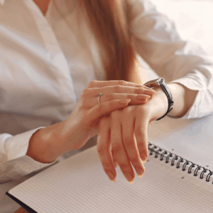woman looking at wristwatch